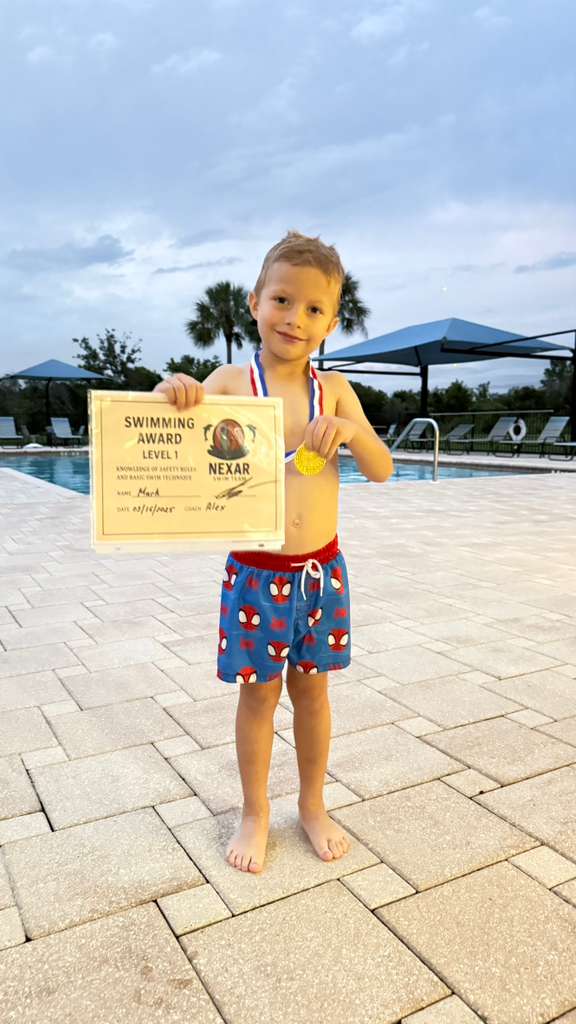 NEXAR Swim Team award